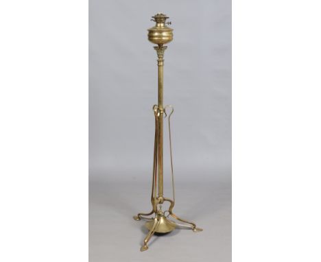 An Art Nouveau brass based rise and fall oil lamp in the Benson style, 144cm. Condition Report. To be used as a guide only. N
