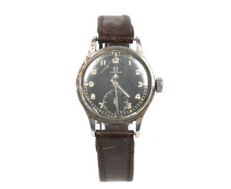 A British Military issue Omega W. W. W. stainless steel manual wristwatch. With black dial bearing the broad arrow mark, Arab
