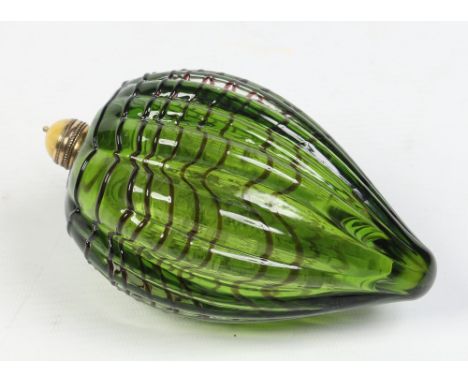 An oversized Victorian fluted emerald green glass scent bottle with overlaid stripe decoration. With brass collar and brass m