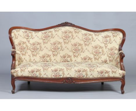 A twentieth century French style carved walnut upholstered scroll arm sofa, 178cm wide. Condition Report. To be used as a gui