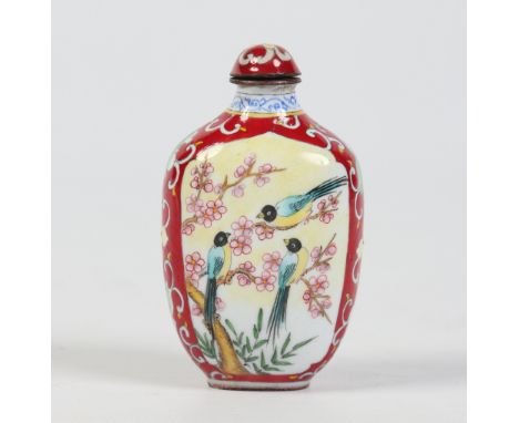 A twentieth century Chinese enamel snuff bottle, red ground and decorated with birds in branches. Four character Qianlong mar