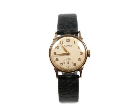 A gentlemans Buren Grand Prix manual wristwatch in 9 carat gold Dennison case with reverse teardrop lugs. With gilt pointed b