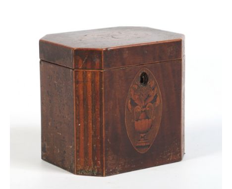A Georgian mahogany and marquetry inlaid small canted tea caddy, 11.5cm. Condition Report. To be used as a guide only. Heavy 