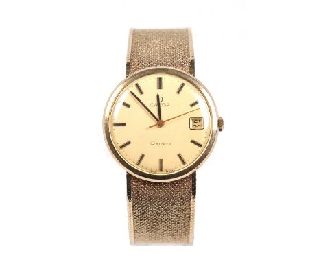 A gentlemans 9 carat gold Omega Geneve manual bracelet watch. With gold satin dial having baton markers, centre seconds and d