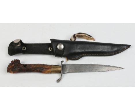 A German hunting knife with stag antler grip and in associated leather sheath. Blade marked Rasiermesser and 14.5cm. Conditio