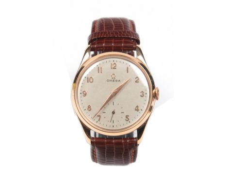A gentleman's Omega 18 carat rose gold manual wristwatch. With satin dial, pointed hands and applied Arabic numeral markers. 