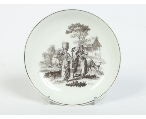 A finely potted Worcester saucer. Printed from a plate engraved by Robert Hancock with the milkmaids pattern in black under a