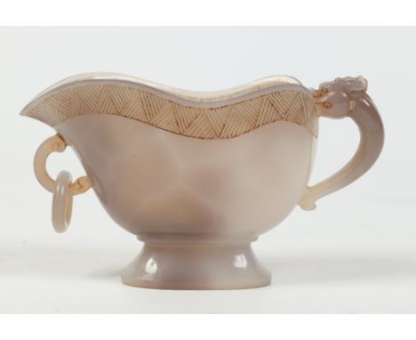 A Chinese carved and polished grey agate ewer of archaistic form. With incised triangle band around the rim and with scrollin