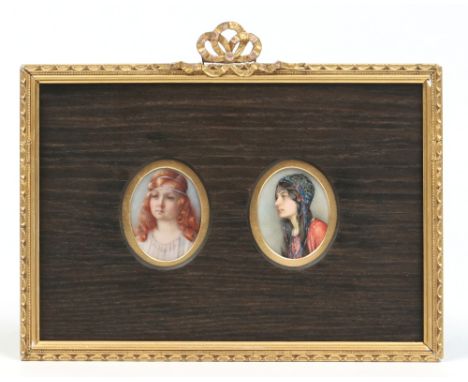 A gilt framed pair of ivory oval portrait miniatures. Each depicting a young woman, possibly sisters, each 6cm x 5cm. Conditi