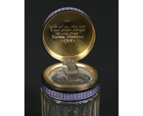 A George V silver topped faceted glass dressing table jar with stopper. Having purple guilloche enamel hinged cover decorated