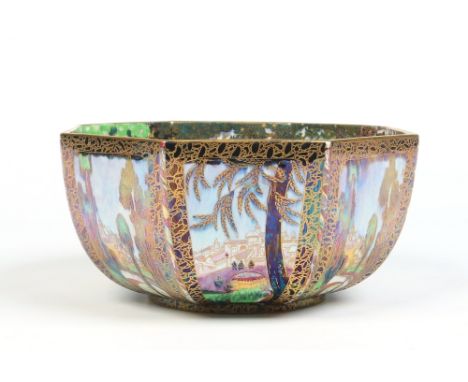 A Wedgwood fairyland lustre octagonal bowl by Daisey Makeig-Jones. Decorated to the interior with a continuing woodland lands