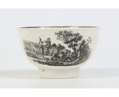 A Richard Chaffer's Liverpool teabowl. Printed in black by Sadler with two rural scenes, one depicts a boy playing a flute wi