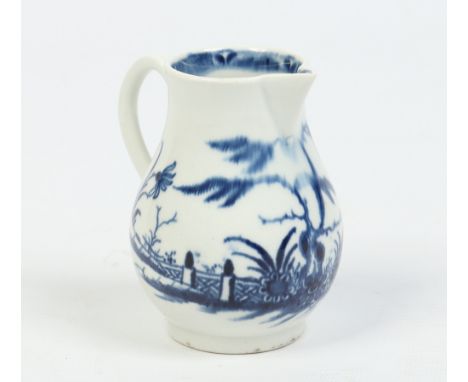 A Worcester sparrow beak cream jug with grooved loop handle. Painted in underglaze blue with the Candle Fence pattern. Cresce