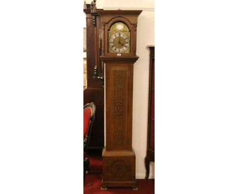 A George III oak 30 hour longcase clock. With brass arch top dial having silvered chapter ring and signed Samuel indistinct, 