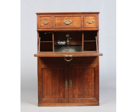 A nineteenth century French oak fitted Toilette de Bureau. With galvanized water hopper and brass fittings. Makers label for 