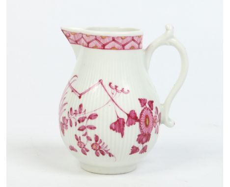 A Worcester tightly fluted baluster cream jug with double scrolling handle. Painted in puce Kakiemon style after a Meissen or