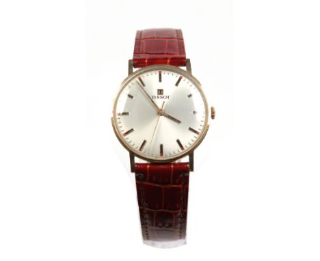 A gentlemans Tissot 18 carat gold cased manual wristwatch c1970. With satin dial, baton markers and centre seconds. On later 
