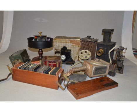 A Praxinoscope with Lantern and Projector Components including an early electrical control box, a modern Praxinoscope, an inc
