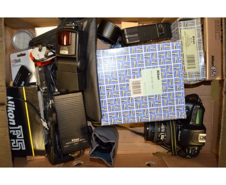 A Nikon F50 SLR Camera, Nikon and Other Accessories, shutter working, with an AF Nikkor 28-105mm f/3.5-4.5 D lens, DB-6 batte