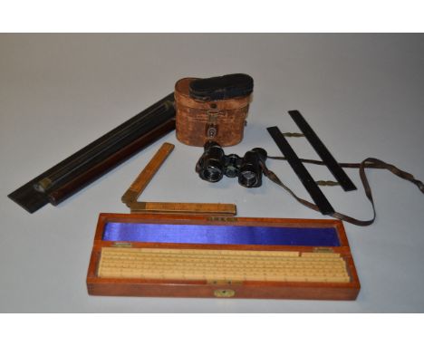 A Collection of Drawing Instruments, including a box of scales, parallel rules, folding rule and overpainted Carl Zeiss binoc