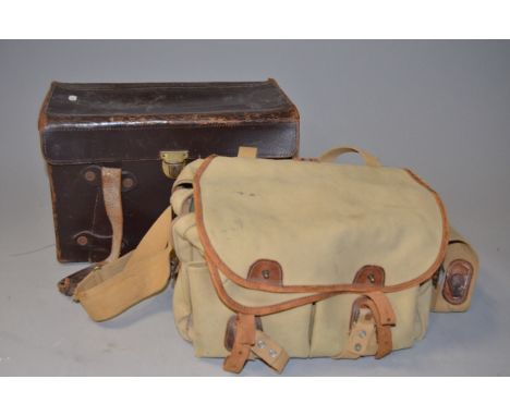 A Billingham Camera Bag, a 445 khaki/tan canvas bag, condition F, and a large leather holdall, 40 x 20 x 28cm approx, conditi