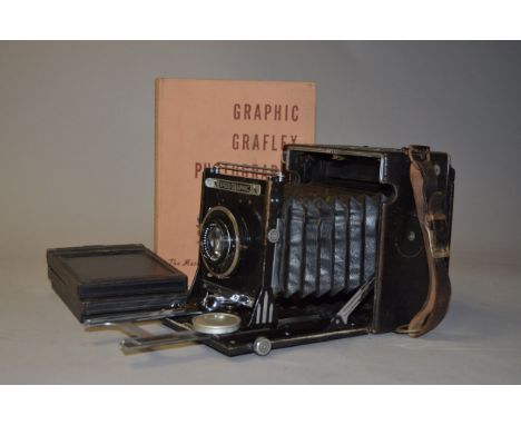 A Folmer-Graflex Speed Graphic 5 x 4" Folding Press Camera, condition F, with a Carl Zeiss Jena Tessar 13.5cm f/4.5 lens, Con