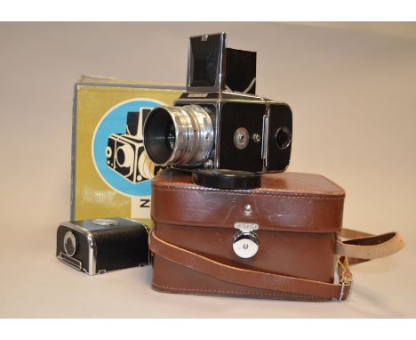 A Zenith 80 Roll Film SLR Camera Outfit, shutter jammed, with a Vitoflex 80mm f/2.8 lens and two film backs, leather case and