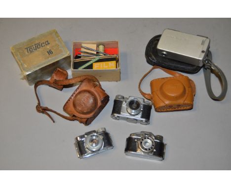 A Minolta-16 Sub-miniature Camera, serial no 542036, with case, together with a Toyoca 16 camera with maker's box, a Minetta 