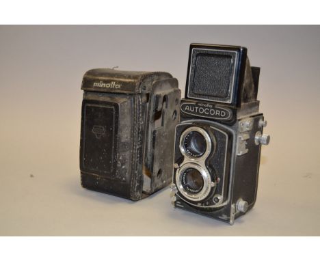 A Minolta Autocord Roll Film TLR Camera, serial no 402088, Rokkor 75mm f/3.5 lens, condition P, crank and shutter stuck