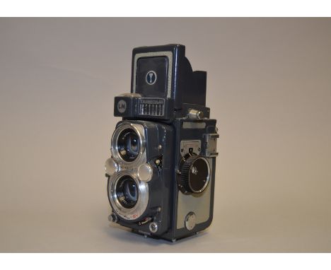 A Yashica 44 LM Roll Film TLR Camera, 4 x 4cm format on 127 roll film, Yashinon 60mm f/3.5 lenses, Copal-SV shutter working, 