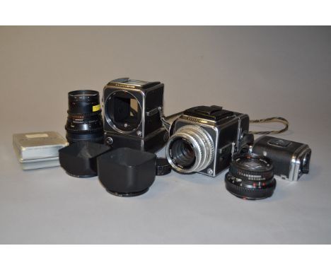 Hasselblad 500 Roll Film Camera Bodies and Lenses, including a Hasselblad 500 C body with WLF and film back, a Hasselblad 500