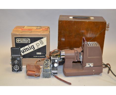 A Verascope Stereo Camera, serial no 29542, with two Zeiss Tessar 55mm f/4.5 lenses, condition P, with Rolleicord IIa Roll Fi