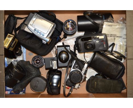 An Olympus OM-2N SLR Camera and Lenses, OM-2N body, serial no 736514, shutter working, with three lenses, a Zuiko MC Auto-S 5