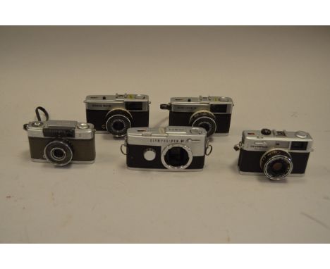 A Group of Olympus 35mm Cameras, including Pen FT half frame SLR body, Pen-EE half frame camera, Olympus 35 RC camera, Olympu