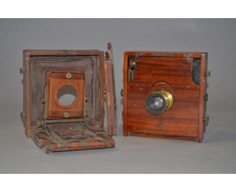 A Lancaster 1890 Instantograph Mahogany Plate Camera, with a Bulmer Dewsbury 7 x 5 Rapid Rectilinear brass lens and another m