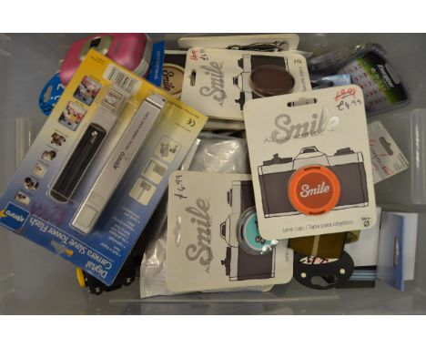 A Box of Digital Camera Small Accessories in Packaging, including  Xize Steadycase, replacement battery, bulk film loader, le