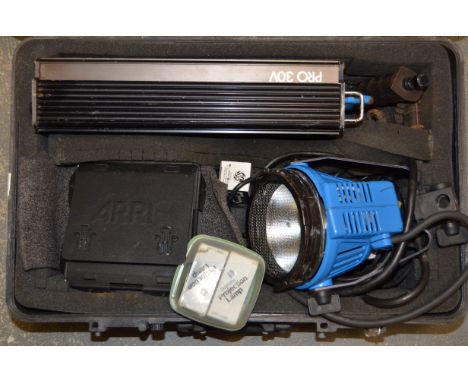 An Arrilite 600 Sun Gun Lighting Kit, including one Arri 600 lamp head, 30V Pro Battery, Charger, Strap, Grip, Barndoors, Dic