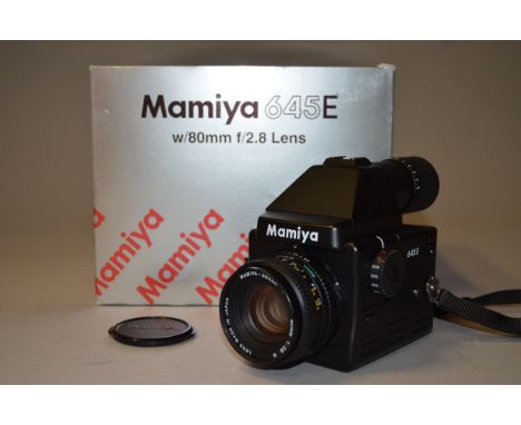 A Mamiya 645E Roll Film SLR Camera, with a  Mamiya-Sekor N 80mm f2.8 lens, shutter working, body E, elements F, fungus on fro