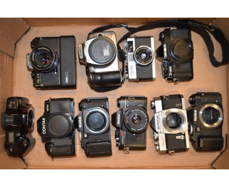 A Tray of Konica and Other SLR Bodies and Cameras, including Konica Autoreflex T body and TC camera, Konica FS-1 bodies (2 ex