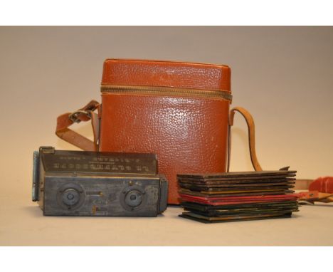 A Jules Richard 'Le Glyphoscope' Stereo Camera, serial no 67 773, body G, in makers case, with a qty of film plates and glass