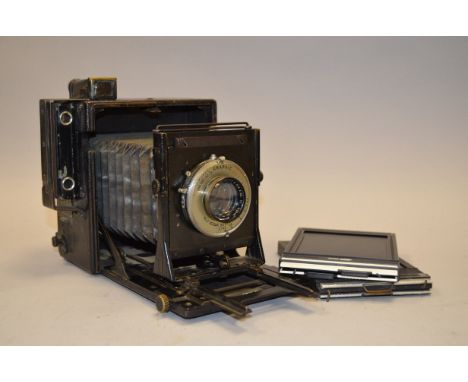 A Folmer Graflex Speed Graphic 5"x 4" Camera, condition F, with a Kodak Anastigmat 6?" f/4.5 lens, elements F-G, some interna