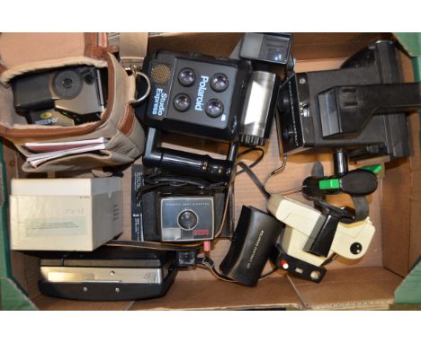 A Group of Polaroid Instant Cameras, including a Polaroid Studio Express, a Swinger Model 20, a Super Swinger, an Automatic 2