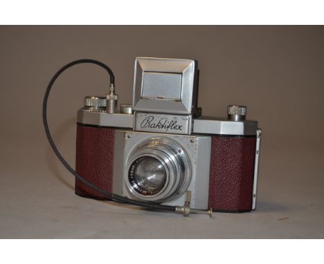 A Praktiflex 35mm SLR Camera serial no 2681, chrome body red leather, circa 1940 version without lugs, with Schneider-Kreuzna