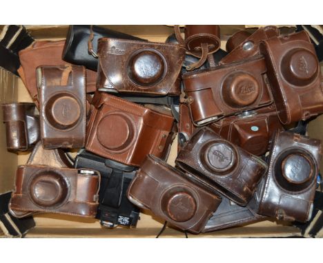 A Quantity of Leica Camera Leather Cases, including ever ready cases for Leica and others, other photographic cases and a Pol