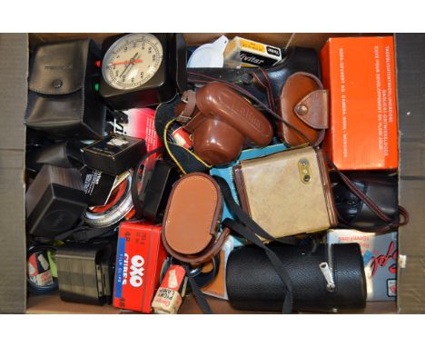 A Tray of Cameras and Accessories, including a Miranda MS-3 SLR camera, two Praktica SLR bodies, a Brownie Flash B box camera