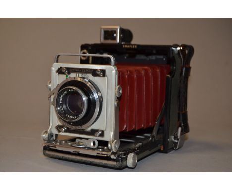 A Graflex Century Graphic 2¼ x 3¼" Press Camera, serial no 528250, red bellows with a Rodenstock Ysarex 105mm f/4.5 lens and 