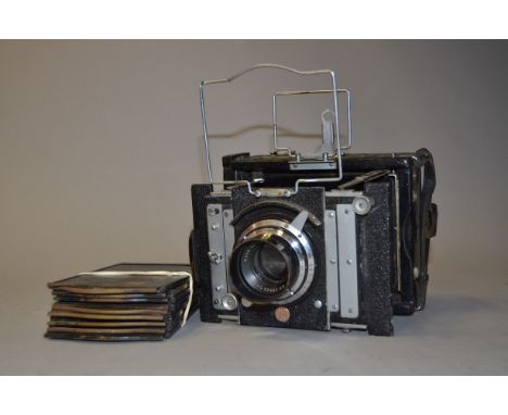 A Van Neck Folding Press Camera, condition P, with Ross Xpres 6" (152mm) f/4.5 lens, condition F, focal plane shutter unteste