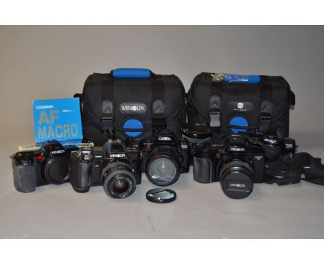 A Group of Minolta Dynax SLR Cameras, including a Dynax 7xi with an AF 28-105mm f/3.5-4.5 lens, a Dynax 700si with an AF 28-1