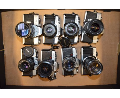 A Tray of Minolta SLR Cameras, including Minolta SRT 101, SRT 101b, XG 1, XG 2, XG-M (2), X-300 (2), with Minolta lenses and 