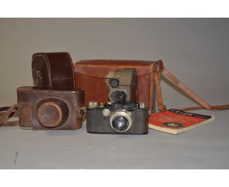 A Leica III Rangefinder Camera, black, serial no 109824, 1933, condition P, shutter working, a Summar 5cm f/2 lens no 218062,